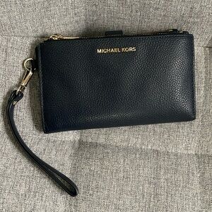 Michael Kors leather smartphone gently used wallet. Navy blue. AUTHENTIC
